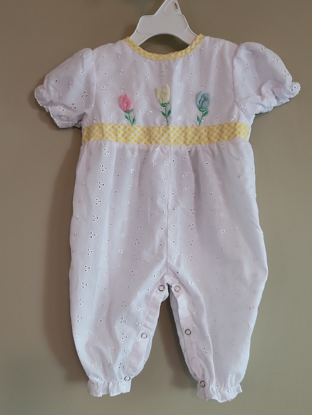 Super cute vintage white eyelet cotton romper with flower detail
